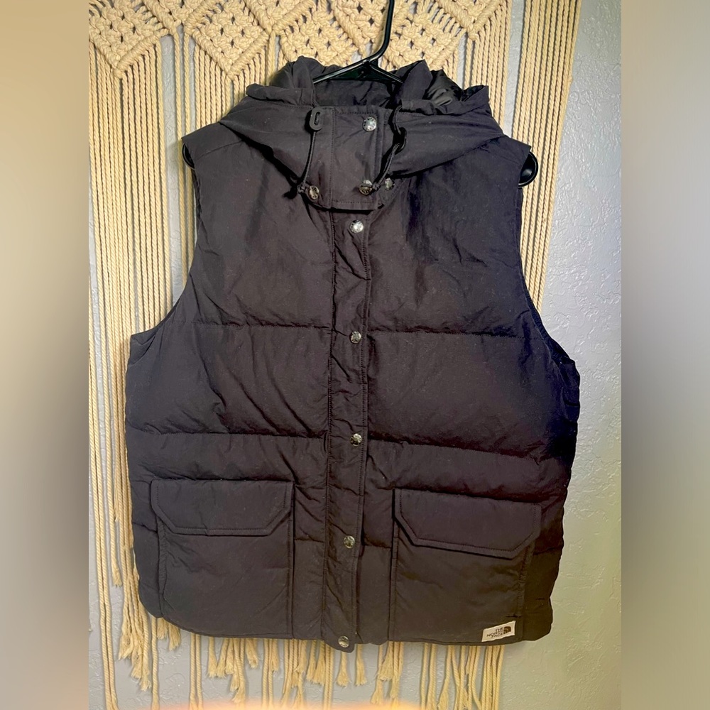 North Face LG women’s black vest with snap on hood